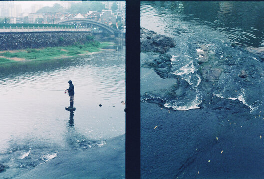 An angler was standing in the water & brook
