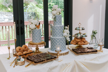 tabletop with cake and desserts