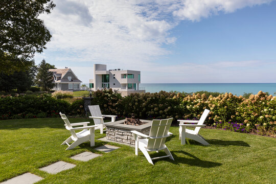 Lake Michigan Autumn landscape with lawn and fire pit 