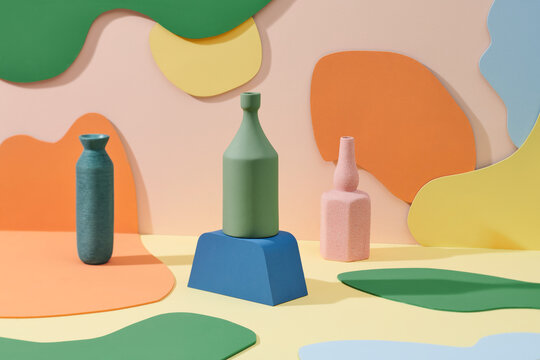 Still life with color vases and colorful figures