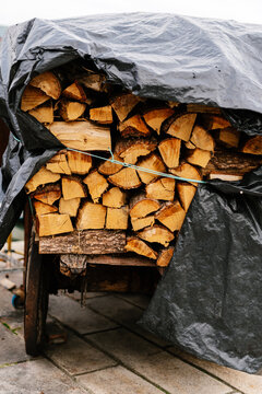 Cart with logs covered with file