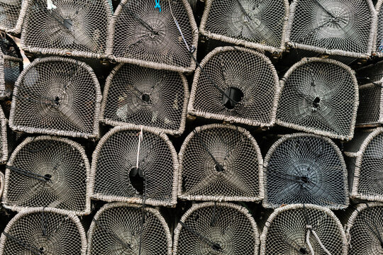 Stacks of crab traps in port