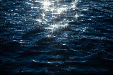 Sun reflection on water stars