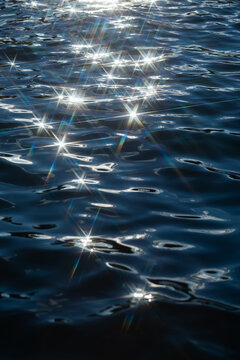 Sun reflection on water stars