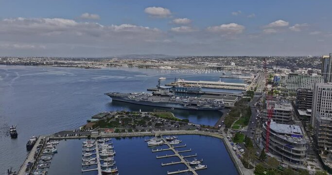 San Diego California Aerial v48 flyover tuna harbor capturing historical and legendary aircraft carrier uss midway museum and core-columbia downtown cityscape - Shot with Mavic 3 Cine - September 2022