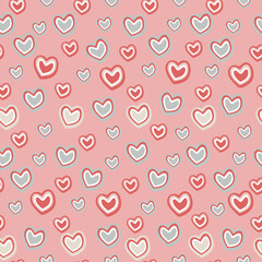 seamless pattern of red blue hearts on a pink background