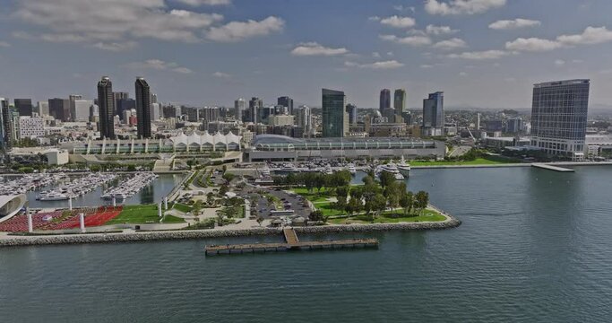 San Diego California Aerial v50 cinematic drone flyover bay capturing embarcadero marina park, busy cruise-ship hub, convention center and downtown cityscape - Shot with Mavic 3 Cine - September 2022