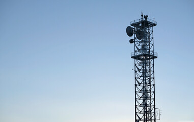 Telecommunication antenna against the blue sky
