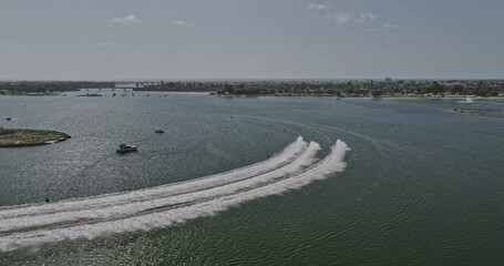 San Diego California Aerial v82 flyover mission bay, annual bayfair festival, hydroplanes take flight on the water racecourse pushing limits in high speed - Shot with Mavic 3 Cine - September 2022