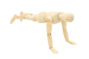 Wooden mannequin human with Push-Up action isolated with clipping path on white background.Photo concept for Sport and Healthy lifestyle