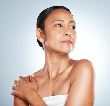 Thinking, Skincare And Senior Black Woman In Studio With Healthy Glow And Body Care Of People. Wellness, Aesthetic And Dermatology Treatment Of Mature Person On Isolated Gray Background.