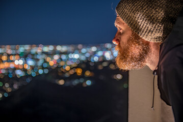 Man enjoying night view from observatory