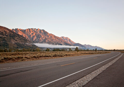 The early morning sun hits the Cathedral Group, Grand Teton National Park.