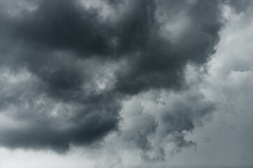 dark clouds make sky in black. Heavy rain thunderstorm . Pattern of clouds overcast predict tornado, Hurricane or thunderstorm and rainy.