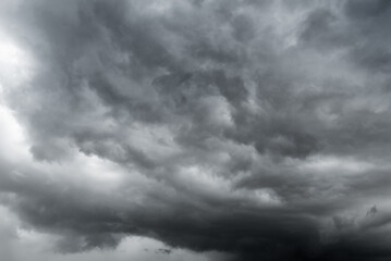 dark clouds make sky in black. Heavy rain thunderstorm . Pattern of clouds overcast predict...