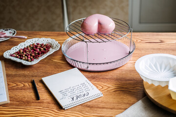 Perfect custom pink heart shape made cake in kitchen Bakery. Online Cake Store. custom cake order for Every Special Event