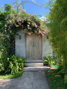 UGC wood door with flowers and bamboo on bali indonesia