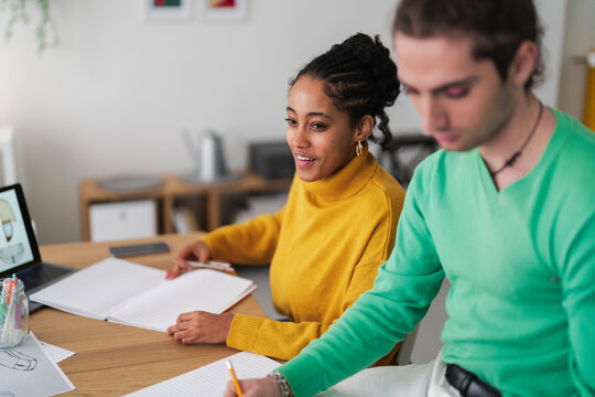 Happy Diverse Colleagues Working On Project In Office At Home