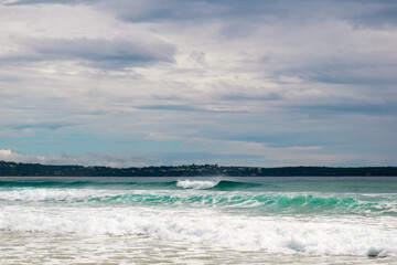 breaking wave at pambula beach