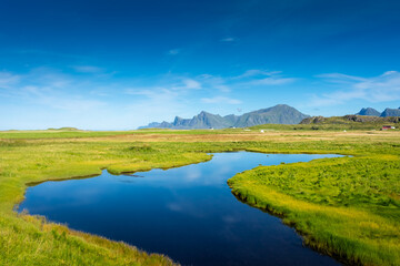 Landscape with river and mountains in the Lofoten Islands,  Norway
