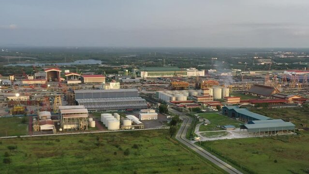 Aerial view capturing PGEO edible oil refinery food processing centre and sapura energy fabrication yard at lumut port industrial park, Kampung Acheh, Sitiawan, Perak, Malaysia.
