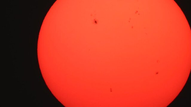 Beautiful sun with black dots .