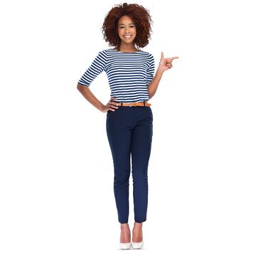 Full Length Shot Of A Beautiful Young African Woman Is Smiling And Pointing To Copyspace Isolated On A PNG Background.