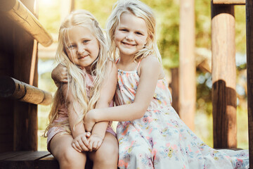 Portrait, children and girl siblings outdoor together at a park during summer vacation or holiday....