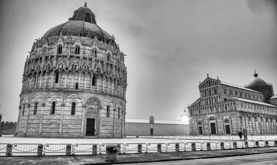 Pisa under the snow. Famous landmarks and monuments of Field of Miracles after a snowstorm