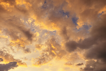 abstract background of cloudy sunset sky golden hour