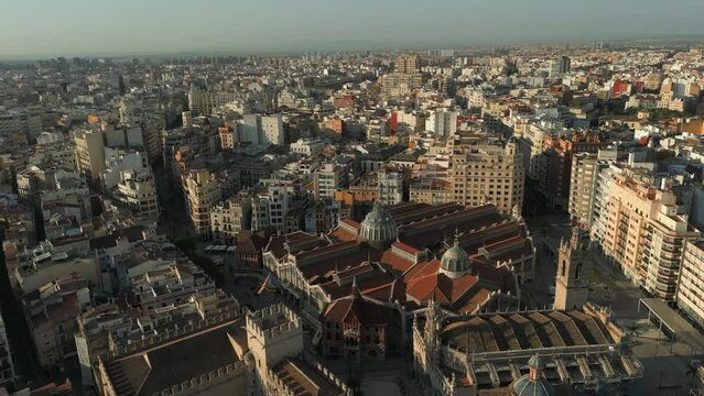 Wide Aerial morning view of Valencia central market landmark and old town in Spain