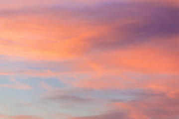 Beautiful cumulus clouds on sunny day at golden hour painted with sun. Atmosphere background
