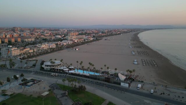 Early morning wide aerial shot of Valencia beach, Spain