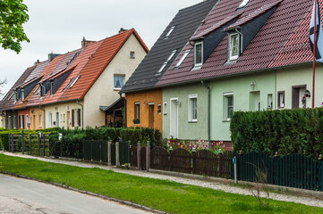 Quiet street with colorful houses in the village.