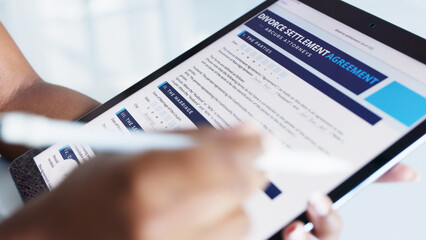 Divorce, tablet and girl with digital agreement, documents or contract contemplating choice to sign. Family law, legal and black woman with pen reading and review online marriage separation paper