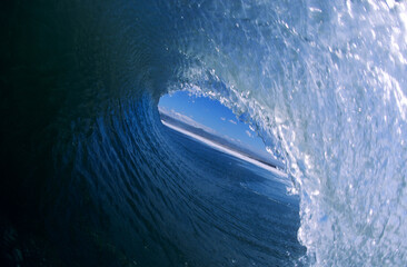 Santa Ana Winds blow the lip of this wave open in Ventura, California. (fisheye)