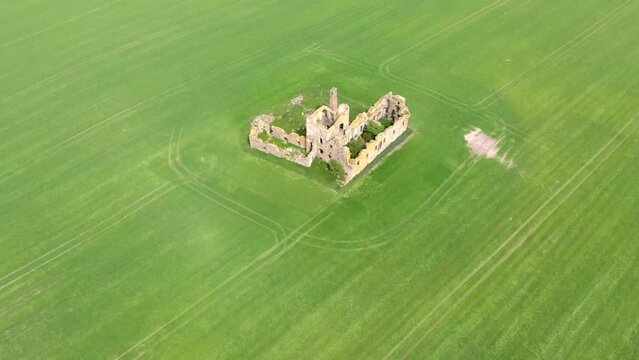 Aerial view of Castle Of Pittulie. Drone footage. Flying around