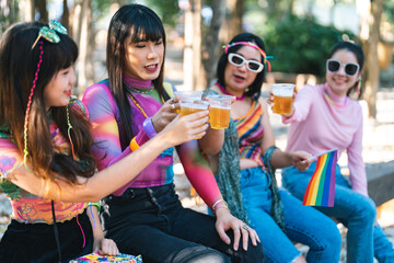 Outdoor Happy friends in summer party. friendship hanging out with drinks celebrate toast having fun at music festival Summer holiday vacation