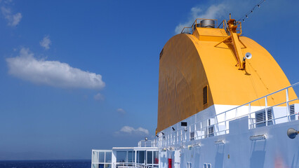 Passenger ferry funnel cruising near Aegean sea of Mykonos island