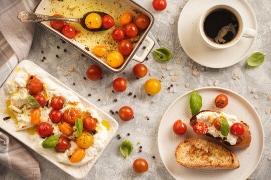 Lunch idea - burrata cheese with baked tomatoes and toasts.  