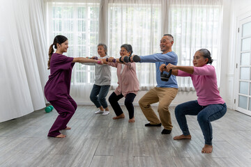 Fototapeta premium Group of senior peoples enjoy to exercise together in nursing home