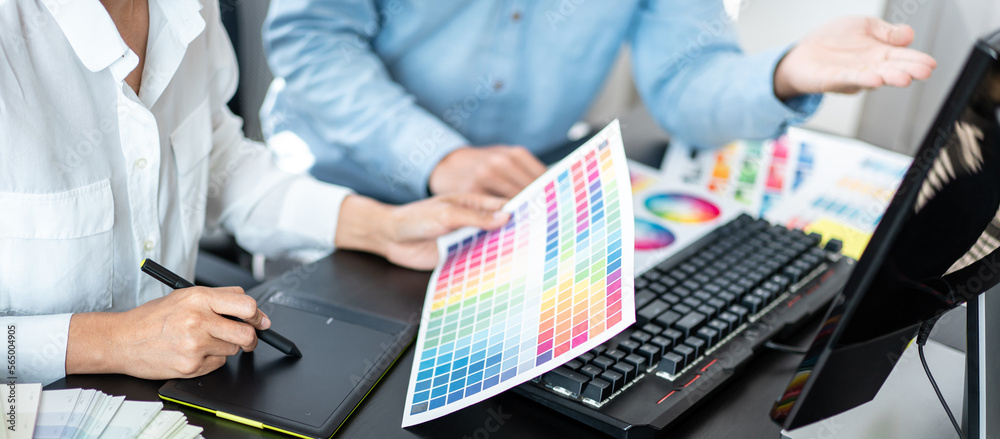 Poster two creative graphic designer team working on color selection an