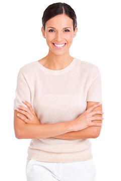 A casually dressed young woman standing with her arms folded isolated on a PNG background.