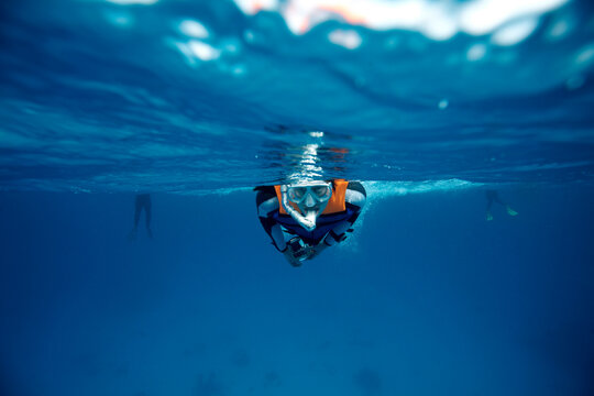 Snorkeler in the surface at Dolfin Reef National Park in Southern Egypt