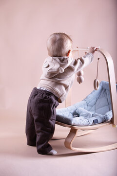 little baby playing with toys. baby playing with baby bouncer