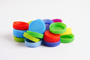 Plastic bottle caps colorful for recycle on white background.