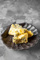 Bowl of blue cheese cubes