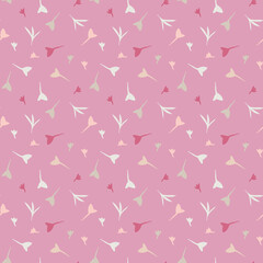 Seamless ditsy pattern of small flowers or leaves on a pink background
