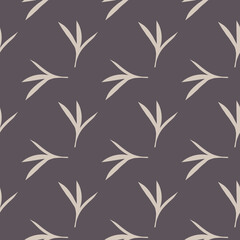 Seamless pattern of three leaves on a brown background
