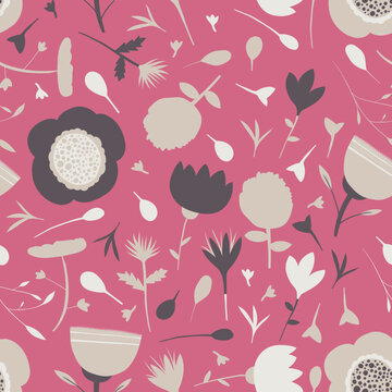 Seamless pattern of scattered flowers on a pink background
